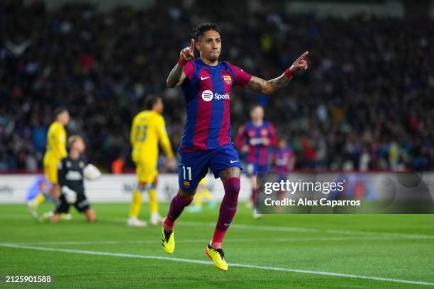 Raphinha of FC Barcelona celebrates scoring his team's first goal during the LaLiga EA Sports match between FC Barcelona and UD Las Palmas at Estadi...