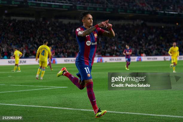 Raphinha of FC Barcelona celebrates after scoring his team's first goal during the LaLiga EA Sports match between FC Barcelona and UD Las Palmas at...