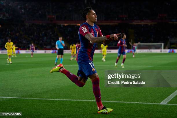 Raphinha of FC Barcelona celebrates after scoring his team's first goal during the LaLiga EA Sports match between FC Barcelona and UD Las Palmas at...