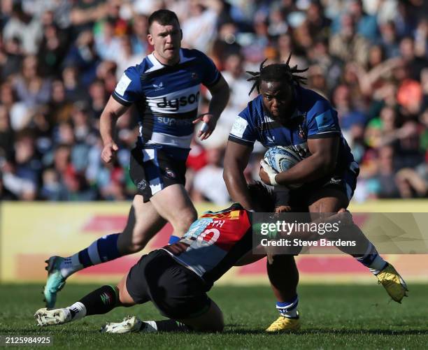 Beno Obano of Bath Rugby is tackled by Marcus Smith of Harlequins during the Gallagher Premiership Rugby match between Harlequins and Bath Rugby at...