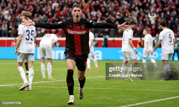 Patrik Schick of Bayer Leverkusen celebrates after scoring his teams winning goal during the Bundesliga match between Bayer 04 Leverkusen and TSG...