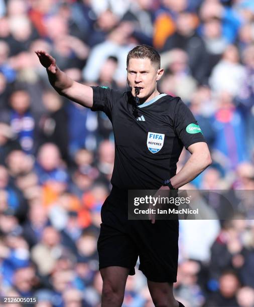 Match referee David Dickinson is seen during the Cinch Scottish Premiership match between Rangers FC and Hibernian FC at Ibrox Stadium on March 30,...