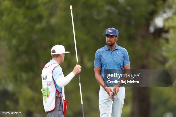 Tony Finau of the United States waits on the 13th green during the third round of the Texas Children's Houston Open at Memorial Park Golf Course on...