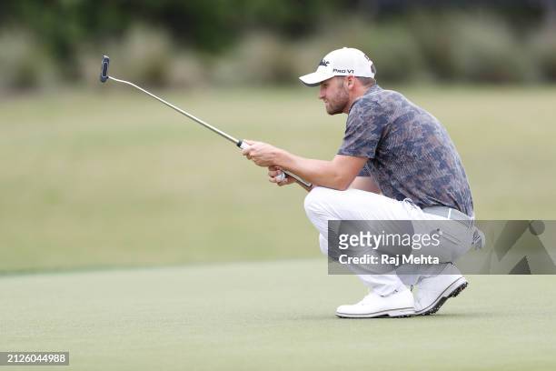 Wyndham Clark of the United States lines up a putt on the ninth green during the third round of the Texas Children's Houston Open at Memorial Park...