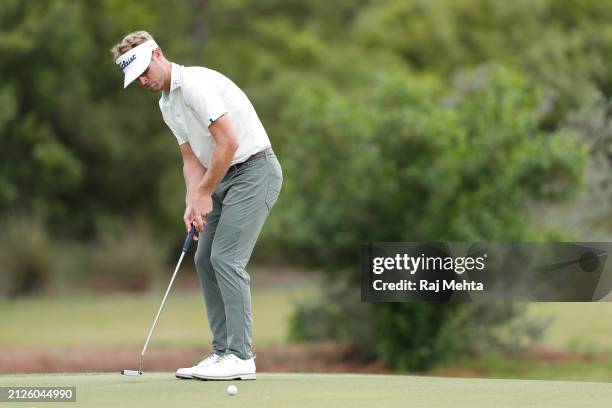 Tyson Alexander of the United States putts on the ninth green during the third round of the Texas Children's Houston Open at Memorial Park Golf...