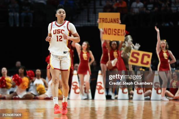 JuJu Watkins of the USC Trojans looks on during the first half against the Baylor Lady Bears in the Sweet 16 round of the NCAA Women's Basketball...