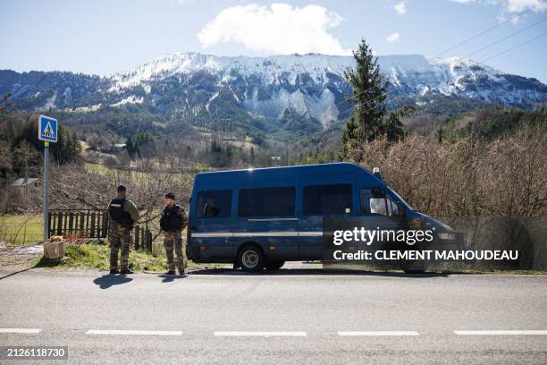 French Gendarmes secure a perimeter around the French southern Alps tiny village of Le Haut-Vernet, in Le Vernet on April 2 two days after French...