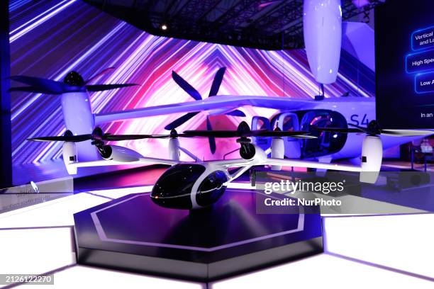 The S4-SKT, an unmanned passenger drone developed by SK Telecom, is on display and is providing visitors with a ride simulation through Seoul's...