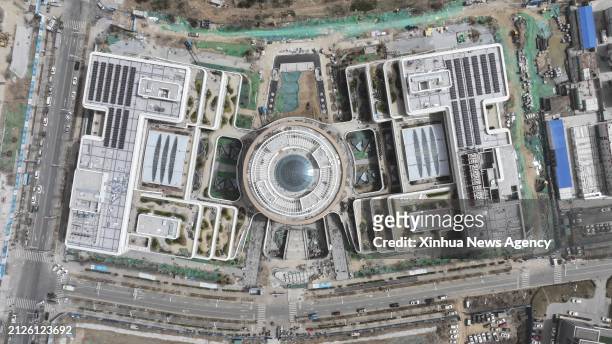 An aerial drone photo taken on March 28, 2024 shows the construction site of the China Telecom smart city industrial park in Xiong'an New Area, north...