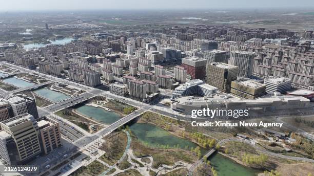 An aerial drone photo taken on March 29, 2024 shows the Rongdong area of Xiong'an New Area, north China's Hebei Province. In April 2017, China...