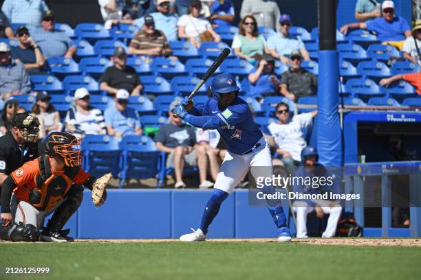 Devonte Brown of the Toronto Blue Jays bats during the eighth inning of a spring training game against the Baltimore Orioles at TD Ballpark on March...