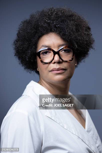French obstetrics and gynaecology doctor Amina Yamgnane poses during a photo session in Paris on April 02, 2024.