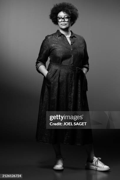 French obstetrics and gynaecology doctor Amina Yamgnane poses during a photo session in Paris on April 02, 2024.