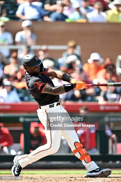 Jorge Soler of the San Francisco Giants bats during the third inning of a spring training game against the Cincinnati Reds at Scottsdale Stadium on...