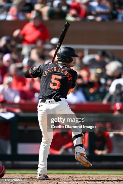 Mike Yastrzemski of the San Francisco Giants bats during the third inning of a spring training game against the Cincinnati Reds at Scottsdale Stadium...