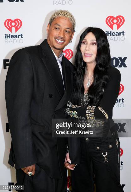 Alexander Edwards and Cher pose in the press room during the 2024 iHeartRadio Music Awards at Dolby Theatre on April 01, 2024 in Hollywood,...