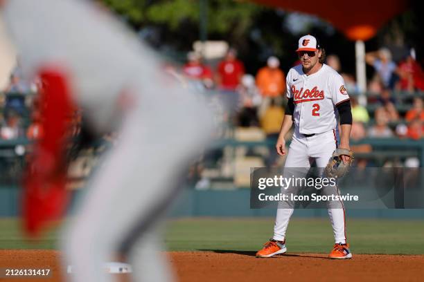 Baltimore Orioles shortstop Gunnar Henderson looks on during an MLB spring training game against the Philadelphia Phillies on March 20, 2024 at Ed...