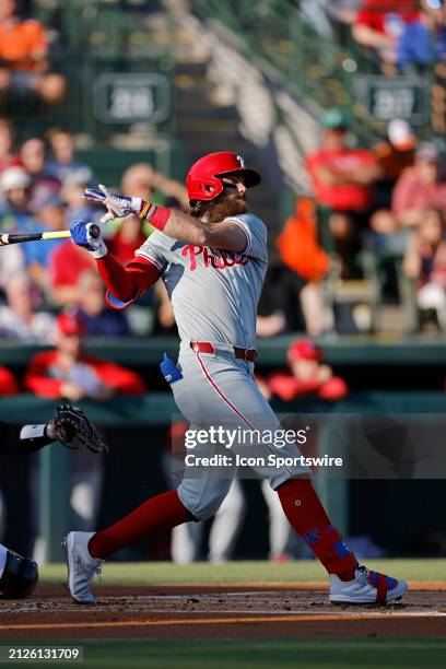 Philadelphia Phillies left fielder Brandon Marsh bats during an MLB spring training game against the Baltimore Orioles on March 20, 2024 at Ed Smith...