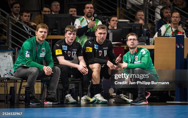 Assistant coach Maximilian Rinderle, Nils Lichtlein, Lasse Bredekjaer Andersson and coach Jaron Siewert of the Fuechse Berlin during the EHF European...