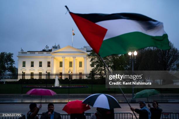 Pro-Palestinian demonstrators call for a ceasefire in Gaza during a protest as part of the "People's White House Ceasefire Now Iftar" outside the...