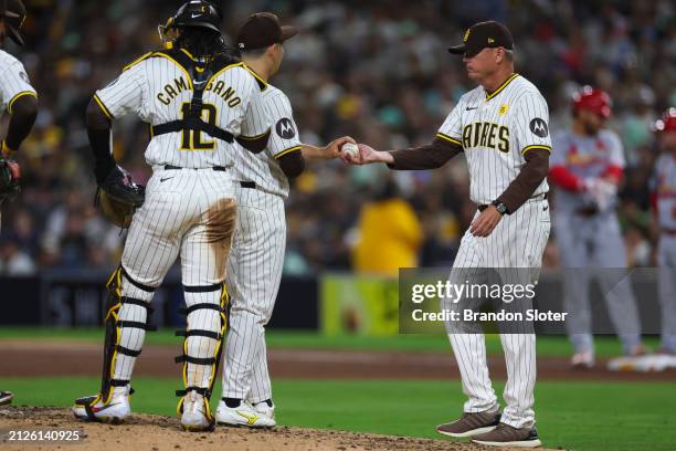 Yuki Matsui of the San Diego Padres is removed from the game by manager Mike Shildt during a pitching change in the eighth inning against the St....