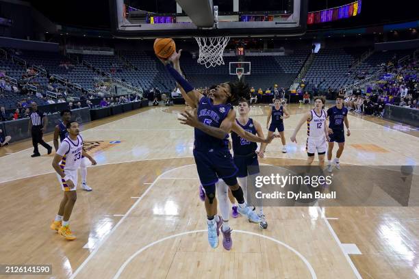 Trey Doomes of the Nova Southeastern Sharks attempts a layup in the second half against the Minnesota State Mavericks during the NCAA Division II...
