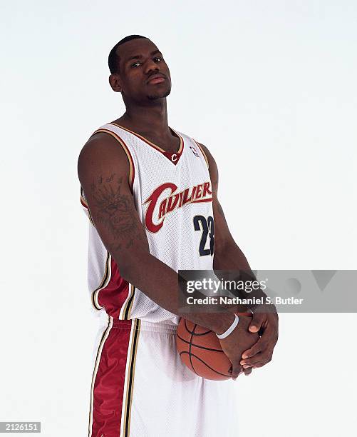 LeBron James poses for a portrait prior to the draft in the white Cleveland Cavaliers uniform for Media Availability Portraits at the Westin Times...