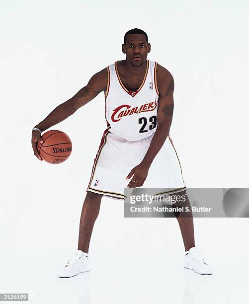 LeBron James poses for a portrait prior to the draft in the white Cleveland Cavaliers uniform for Media Availability Portraits at the Westin Times...