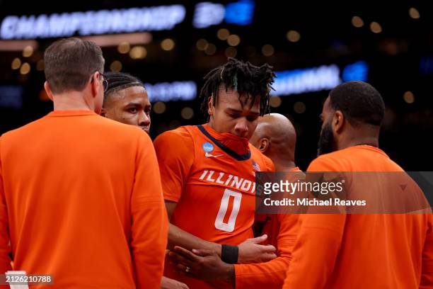 Terrence Shannon Jr. #0 of the Illinois Fighting Illini reacts after being defeated by the Connecticut Huskies the Elite 8 round of the NCAA Men's...