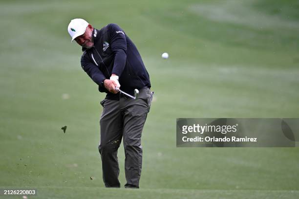 Darren Clarke of Northern Ireland plays a shot on the 11th hole during the second round of The Galleri Classic at Mission Hills Country Club on March...