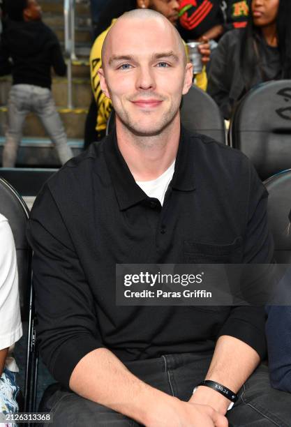 Actor Nicholas Hoult attends the game between the Milwaukee Bucks and the Atlanta Hawks at State Farm Arena on March 30, 2024 in Atlanta, Georgia....
