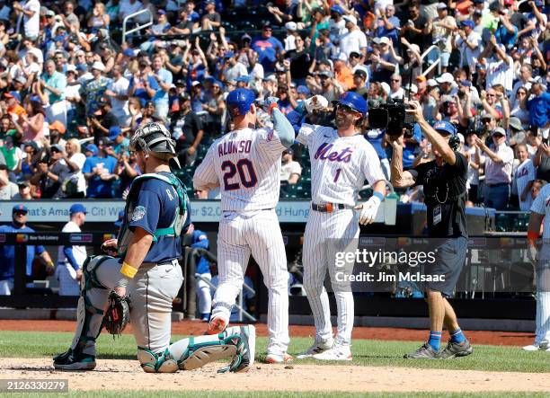 Pete Alonso and Jeff McNeil of the New York Mets in action against the Seattle Mariners at Citi Field on September 03, 2023 in New York City. The...