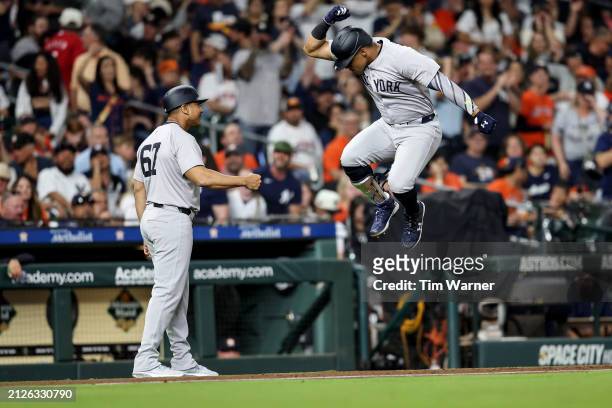 Juan Soto of the New York Yankees celebrates with third base coach Luis Rojas of the New York Yankees after a solo home run in the seventh inning \ah...