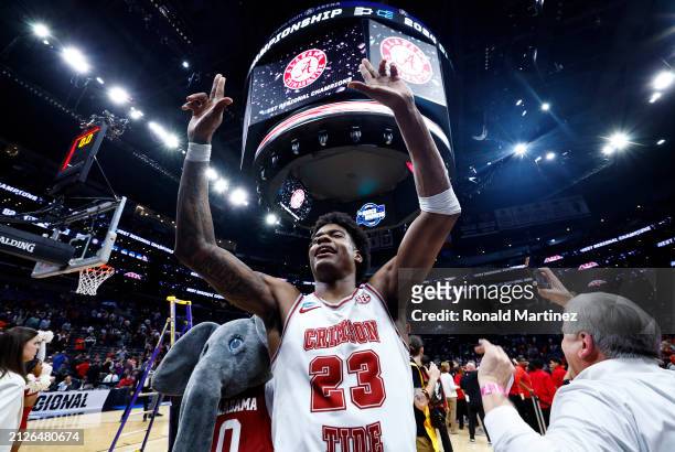 Nick Pringle of the Alabama Crimson Tide celebrates defeating the Clemson Tigers 89-82 in the Elite 8 round of the NCAA Men's Basketball Tournament...