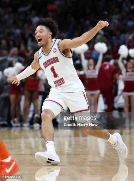 Mark Sears of the Alabama Crimson Tide celebrates defeating the Clemson Tigers 89-82 in the Elite 8 round of the NCAA Men's Basketball Tournament at...