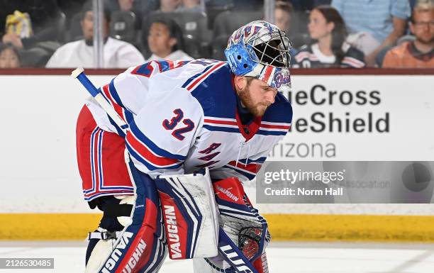 Jonathan Quick of the New York Rangers skates up ice during a stop in play against the Arizona Coyotes at Mullett Arena on March 30, 2024 in Tempe,...