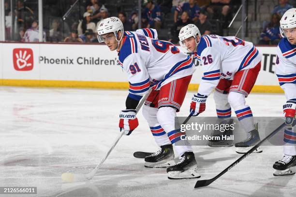 Alexander Wennberg of the New York Rangers gets ready during a face off against the Arizona Coyotes at Mullett Arena on March 30, 2024 in Tempe,...