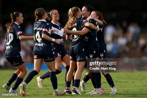 Emily Gielnik of the Victory celebrates with team mates after scoring a goal during the A-League Women round 22 match between Sydney FC and Melbourne...