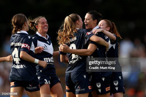 Emily Gielnik of the Victory celebrates with team mates after scoring a goal during the A-League Women round 22 match between Sydney FC and Melbourne...