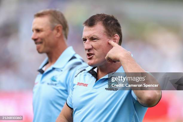 Sharks legends Paul Gallen and Andrew Ettingshausen are interviewed during the round four NRL match between Cronulla Sharks and Canberra Raiders at...