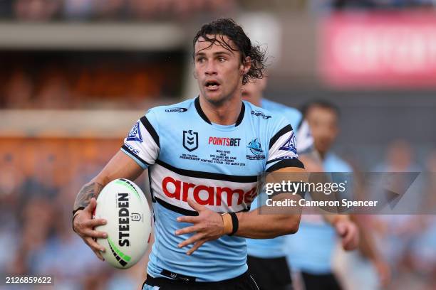 Nicho Hynes of the Sharks runs the ball during the round four NRL match between Cronulla Sharks and Canberra Raiders at PointsBet Stadium, on March...