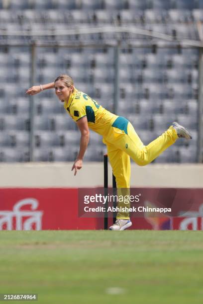Sophie Molineux of Australia bowls during game one of the Women's T20 International series between Bangladesh and Australia at Sher-e-Bangla National...