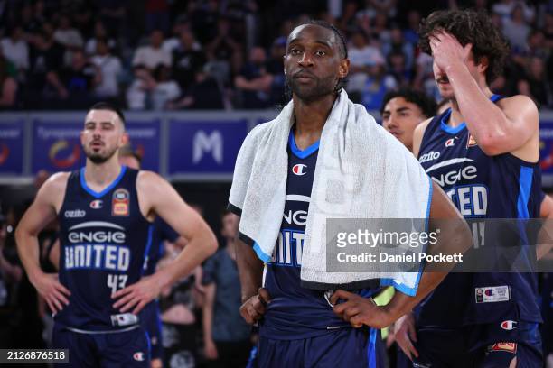 Ian Clark of United and team mates look dejected after their defeat during game five of the NBL Championship Grand Final Series between Melbourne...