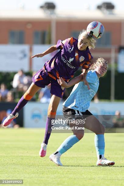 Georgia Cassidy of the Glory and Rhianna Pollicina of Melbourne City contest a header during the A-League Women round 22 match between Perth Glory...