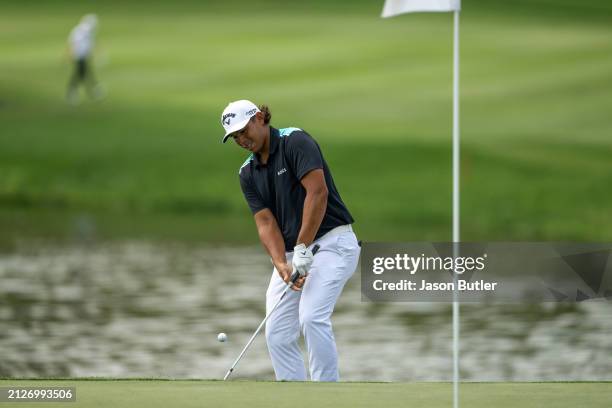 Gavin Green of Malaysia pitches from the green-side bunker on hole 6 during day four of the Hero Indian Open at DLF Golf and County Club on March 31,...