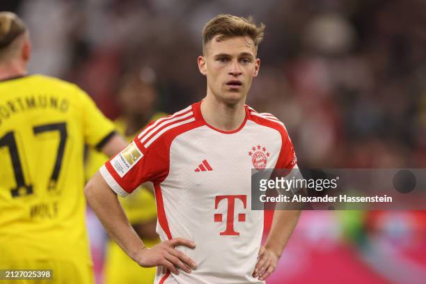 Joshua Kimmich of FC Bayern München looks on after loosing the Bundesliga match between FC Bayern München and Borussia Dortmund at Allianz Arena on...