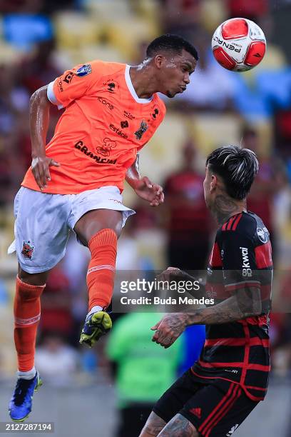 Maicon of Nova Iguaçu competes for the ball with Erick Pulgar of Flamengo during the first leg of the final of Campeonato Carioca 2024 betwee Nova...