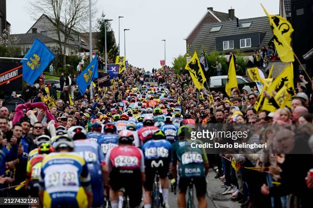General view of the peloton climbing to the Berendries hill while fans cheer during the 108th Ronde van Vlaanderen - Tour des Flandres 2024 - Men's...