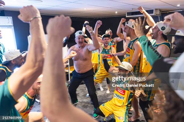 JackJumpers head coach Scott Roth celebrates with the team after winning game five of the NBL Championship Grand Final Series between Melbourne...