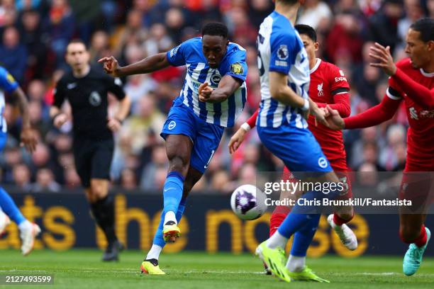 Danny Welbeck of Brighton & Hove Albion scores the opening goal during the Premier League match between Liverpool FC and Brighton & Hove Albion at...